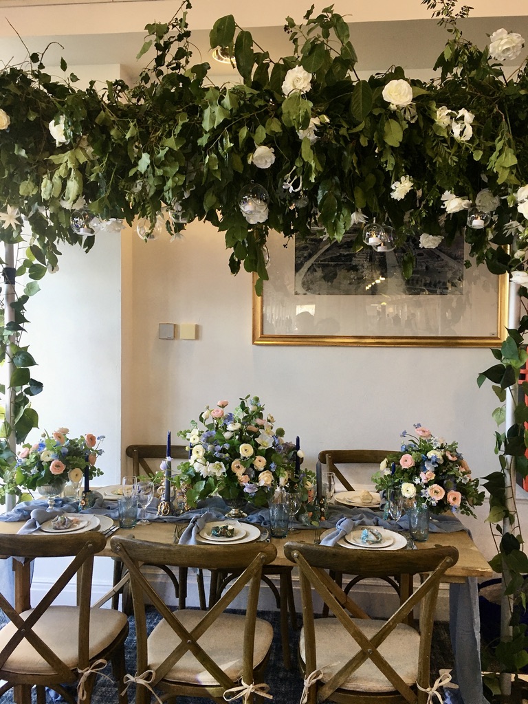 Botanical themed centrepiece and hanging foliage canopy by Fabulous Fucntions UK, with photography by Steffen Milsom Photography 